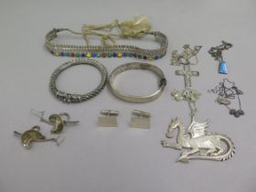 Assorted silver jewellery including a large dragon pendant on chain, cufflinks, earrings,