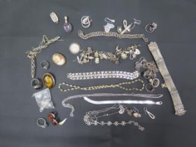 A quantity of assorted silver jewellery to include bracelets, chain, rings, pendants etc - gross