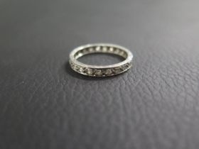 An 18ct white gold (tested) and diamond full eternity ring size P - weight approx 4.1 grams