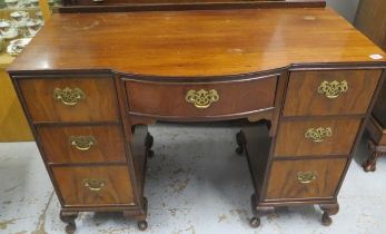 A Walnut bow fronted dressing table - Width 108cm