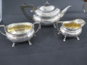 A silver three piece set, Stevenson & Law, Sheffield 1921 - teapot approx 18cm and with Masonic