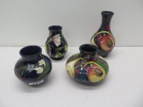 Four Moorcroft vases - Largest 13.5cm and smallest 7.5cm Condition - very good with no chips, no