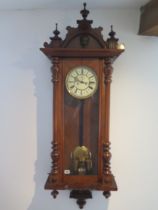 An 8 day double weight Vienna wall clock in a mahogany case