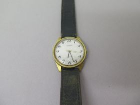 A gents Tissot gold plated wristwatch - round case approx 33mm - working in the saleroom