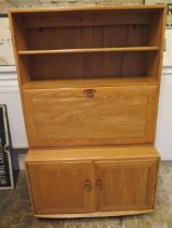 A blonde elm Ercol bureau cabinet with a fitted interior over two doors - Width 92cm x Height 148cm