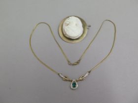 A 9ct gold necklace with green stone, pendant approx 4cm - weight approx 4.2 grams - and a 9ct