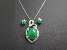 A sterling silver and jadeite/nephrite pendant on chain with matching ear studs - pendant approx 3.