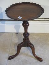 A small carved wine table - Diameter 33cm x Height 52cm