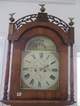 A 19th century 8 day longcase clock with a painted arched dial signed Kirton, Newcastle in an oak