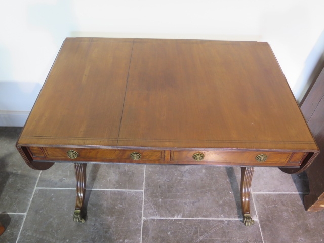 A 19th century mahogany drop leaf sofa table with two active and two dummy drawers on twin pillar - Image 2 of 2