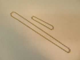 A 9ct yellow gold chain (hallmarked) and bracelet - chain approx 46cm - bracelet approx 17cm - total