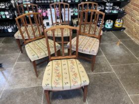 A set of six Georgian mahogany dining chairs