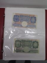An album of bank notes including: 10 Shillings, 1 Pound, 5 Pounds and 10 Pounds, English and