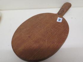 Robert 'Mouseman' Thompson of Kilburn (1876-1955) Oak oval cheese board with carved mouse