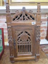 A Gothic carved and pierced pine table top cabinet with lock and key - approx 60cm x 25cm x 33cm