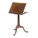 A GEORGE III MAHOGANY MUSIC OR READING STAND C.1770 the hinged top on a ratchet and with an