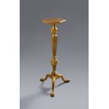 A GEORGE I GILTWOOD AND GESSO CANDLESTAND IN THE MANNER OF JAMES MOORE, C.1720-25 all over relief