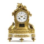 A FRENCH GILT METAL AND WHITE MARBLE MANTEL CLOCK BY BALTHAZAR, PARIS, MID-19TH CENTURY the brass