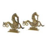 A PAIR OF BRASS HIPPOCAMPI ORNAMENTS MID-19TH CENTURY with articulated reins, on a rectangular foot,