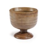 A QUEEN ANNE TREEN FIELD ASH LOVING CUP EARLY 18TH CENTURY the body with concentric ring decoration,
