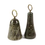 TWO CORNISH SERPENTINE DOORSTOPS LATE 19TH / EARLY 20TH CENTURY each with a brass ring handle (2)