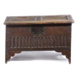 A SMALL BOARDED OAK COFFER MID-17TH CENTURY AND LATER the later lid above a thumbnail decorated