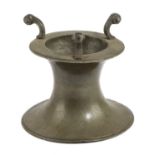 A PEWTER CAPSTAN MASTER SALT LATE 17TH / EARLY 18TH CENTURY of waisted form with three scrolling