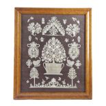 A GEORGE II AND LATER CUT PAPER AND PIN PRICK SAMPLER STYLE PICTURE DATED '1747' with a central