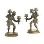 A PAIR OF BRASS FIGURAL CANDLESTICKS LATE 19TH CENTURY modelled after Giambologna's sculpture of a