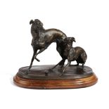 A FRENCH BRONZE GROUP OF TWO WHIPPETS AFTER PIERRE-JULES MENE (FRENCH 1810-1879) modelled chasing
