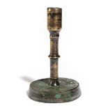 A RARE ENGLISH COPPER ALLOY OR LATTEN CANDLESTICK 15TH CENTURY the socket above a stem with a