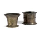 A CHARLES II BRONZE MORTAR LATE 17TH CENTURY of flared form with a spreading foot and the remains of