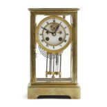A FRENCH BRASS FOUR GLASS MANTEL CLOCK LATE 19TH CENTURY the brass eight day drum movement