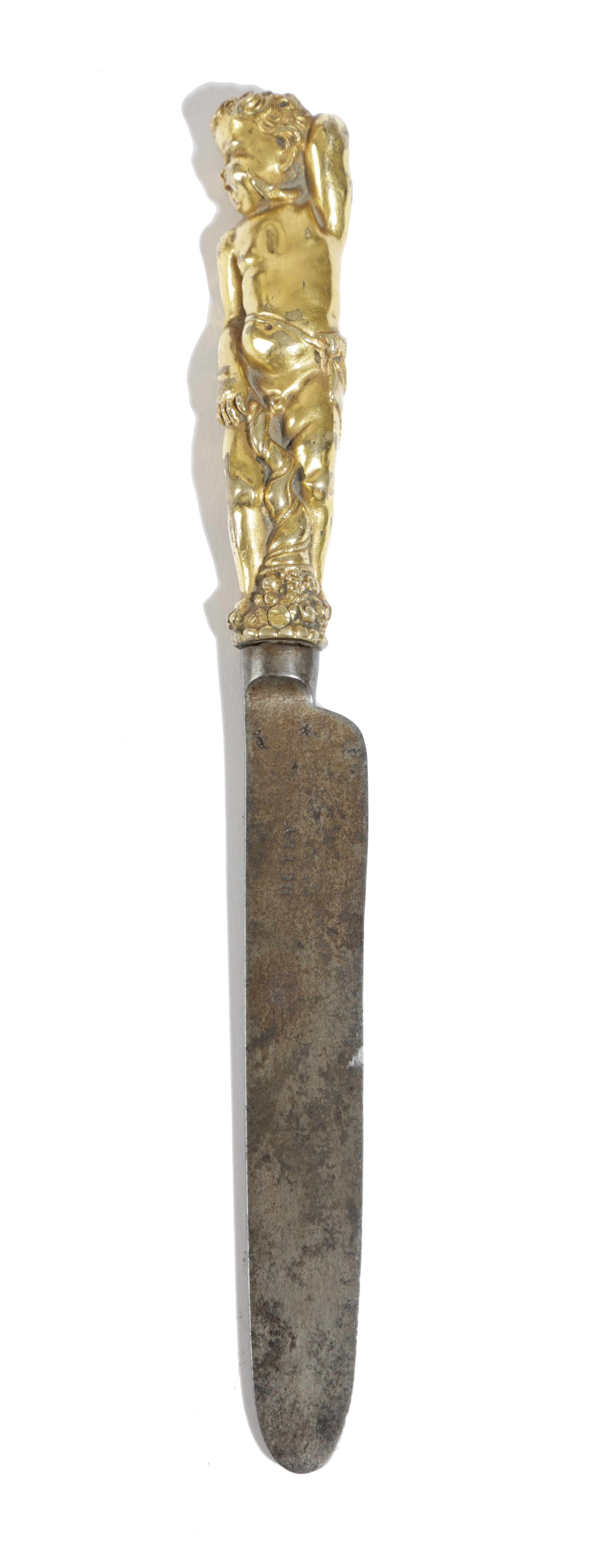 A GILT BRONZE KNIFE HANDLE PROBABLY ITALIAN, LATE 17TH CENTURY the infant god, probably Hercules,