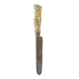 A GILT BRONZE KNIFE HANDLE PROBABLY ITALIAN, LATE 17TH CENTURY the infant god, probably Hercules,