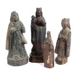 A COLLECTION OF FOUR CARVED WOOD FIGURES 14TH CENTURY AND LATER including a Madonna and Child, a