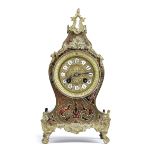 A FRENCH BOULLE MARQUETRY MANTEL CLOCK IN LOUIS XV STYLE the brass eight day movement striking on