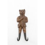 A BLACK FOREST LINDEN WOOD COAT HOOK LATE 19TH / EARLY 20TH CENTURY in the form of a fox, with