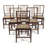 A SET OF SIX LATE GEORGE III MAHOGANY COUNTRY DINING CHAIRS IN SHERATON STYLE, C.1800-10 each with a