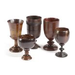 A GEORGE III TREEN FRUITWOOD GOBLET LATE 18TH CENTURY with a flared bowl on a stepped foot, together