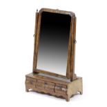 A GEORGE II WALNUT AND FEATHER BANDED TOILET MIRROR EARLY 18TH CENTURY the shaped rectangular