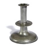 A COMMONWEALTH PEWTER TRUMPET CANDLESTICK MID-17TH CENTURY with banded decoration to the neck,