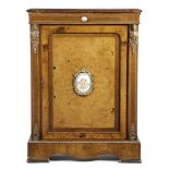 A VICTORIAN WALNUT PIER CABINET C.1860-70 with gilt bronze mounts and applied with porcelain plaques