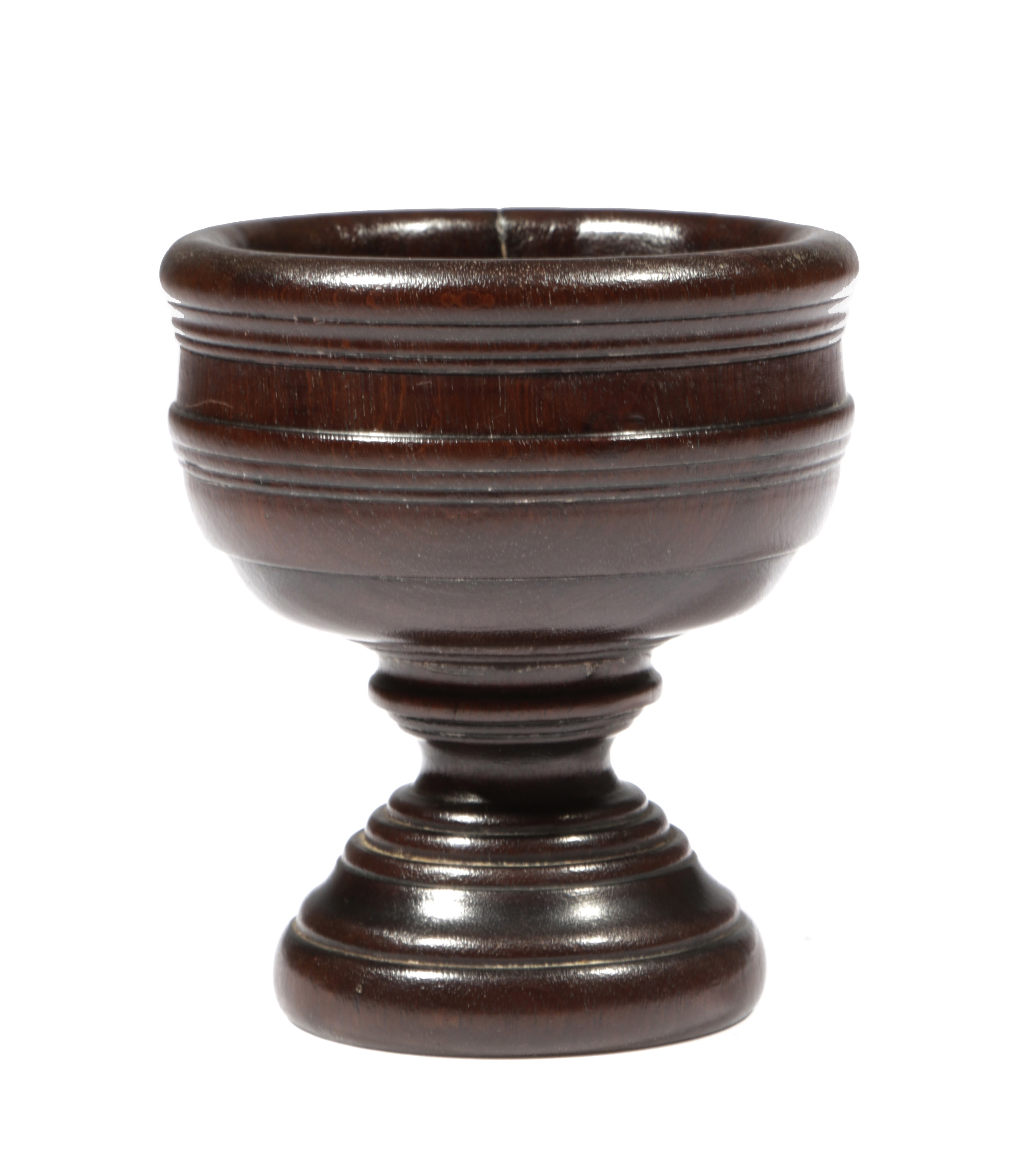 A TREEN SALT 18TH CENTURY possibly walnut, the bowl decorated with reeded bands 11.2cm high