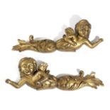 A PAIR OF GILTWOOD WINGED MERMAIDS LATE 19TH CENTURY modelled facing left and right, with clenched