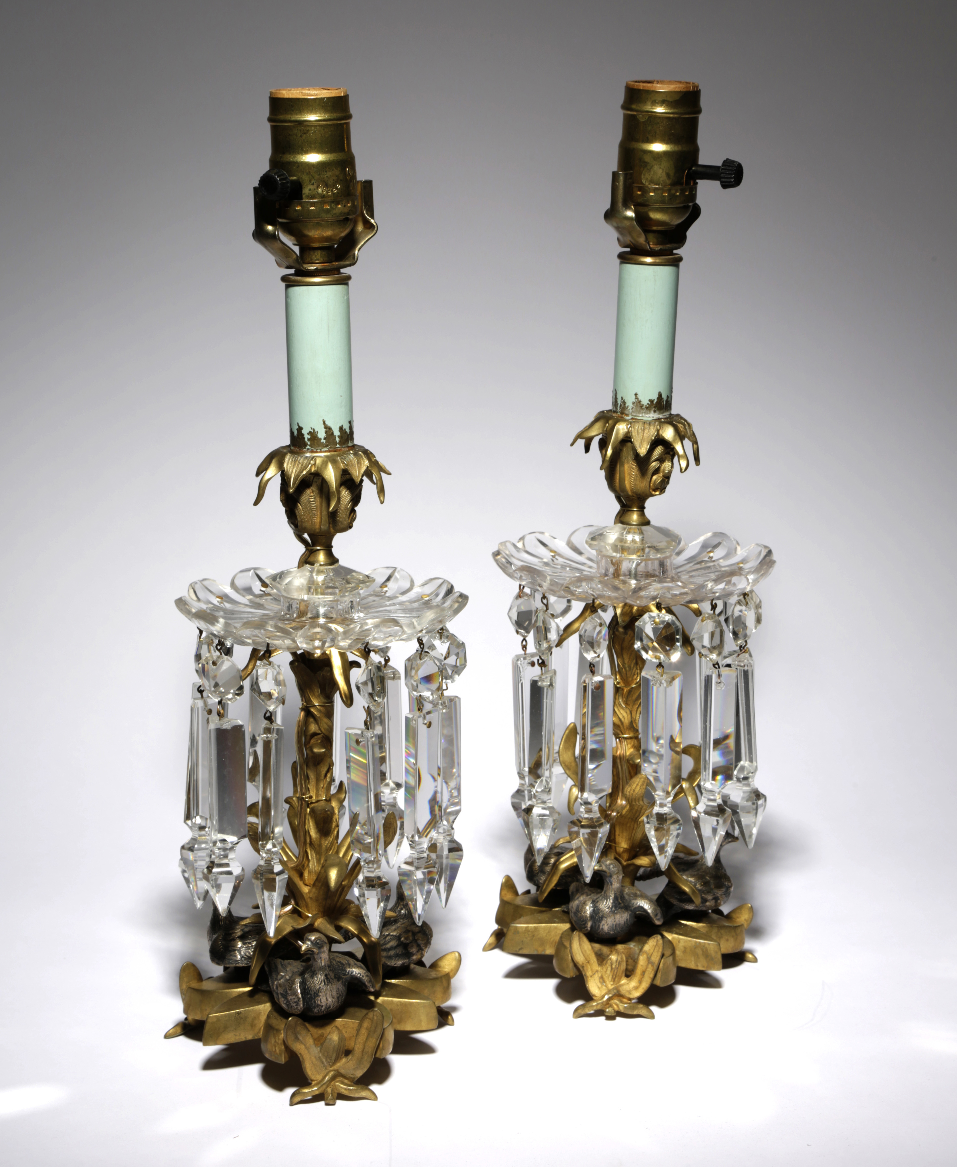 A PAIR OF FRENCH GILT BRONZE LUSTRE CANDLESTICKS 19TH CENTURY each with a glass drip-tray and