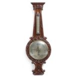 A VICTORIAN MAHOGANY WHEEL BAROMETER BY W. JOHNSON, LONDON. C.1840 with a thermometer above the