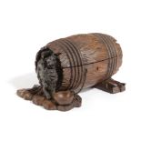 A BLACK FOREST LINDEN WOOD BARREL CASKET LATE 19TH CENTURY the rope bound barrel with two chained