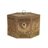 A GEORGE III QUILLWORK OR SCROLLED PAPER TEA CADDY C.1800 of hexagonal form, with string edging,