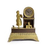 A FRENCH EMPIRE GILT BRONZE MANTEL CLOCK EARLY 19TH CENTURY the brass eight day drum movement